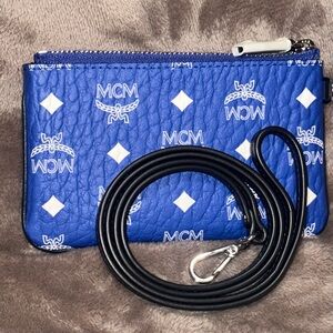 MCM Blue Wristlet with Monogram Design and Silver Hardware